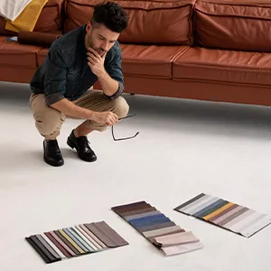specialty designer choosing flooring samples